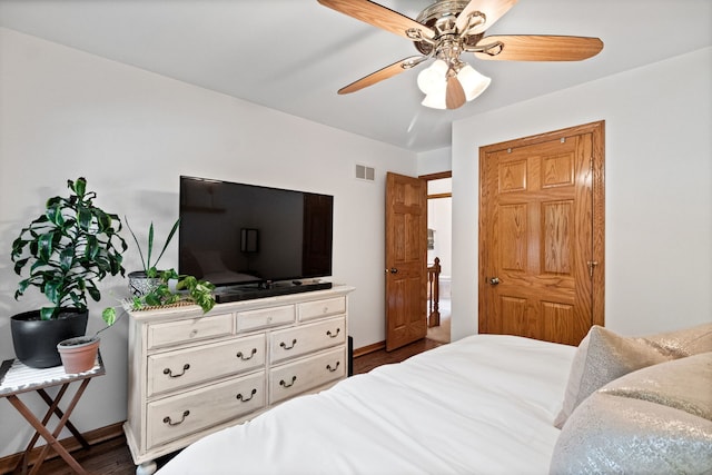 674 Carriage Dr, Batavia, IL 60510 - bedroom featuring dark wood-style flooring and ceiling fan