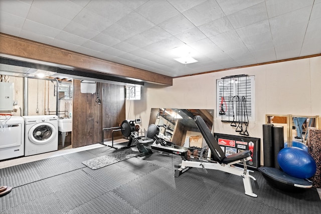 674 Carriage Dr, Batavia, IL 60510 - exercise area with washer and dryer and a sink