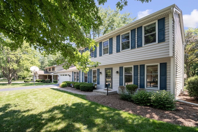 674 Carriage Dr, Batavia, IL 60510 - colonial home with a garage, a front yard, and driveway