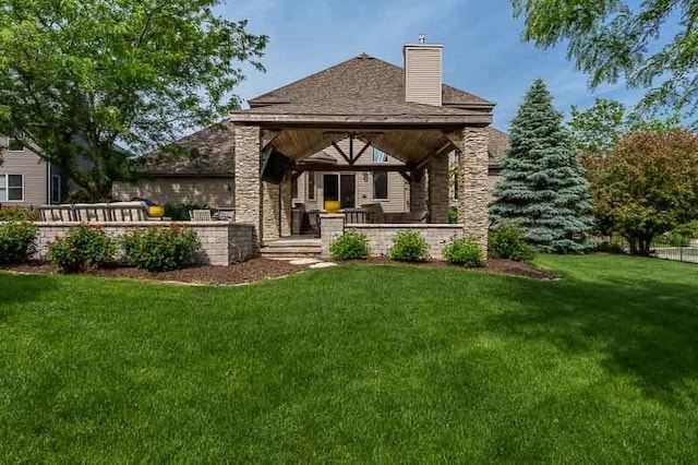 12499 Ayrshire Ln, Loves Park, IL 61111 - rear view of house featuring a yard and a chimney