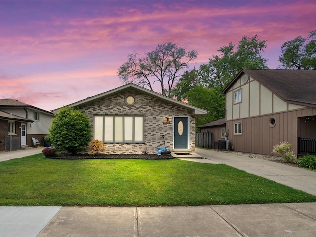 5809 W 90th Pl, Oak Lawn, IL 60453 - view of front of property with a lawn, brick siding, and entry steps