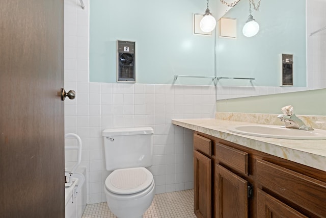 1150 E Jackson St Unit 1A, Lombard, IL 60148 - bathroom featuring tile walls, vanity, and tile patterned flooring