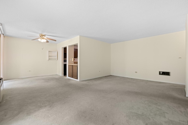 1150 E Jackson St Unit 1A, Lombard, IL 60148 - empty room featuring a ceiling fan and light colored carpet