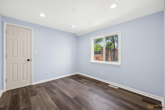 9509 S Merrion Ave, Chicago, IL 60617 - spare room with dark wood-type flooring and recessed lighting