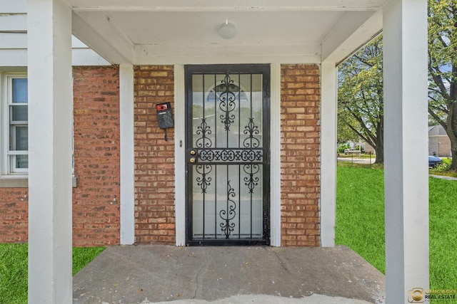 9509 S Merrion Ave, Chicago, IL 60617 - doorway to property with brick siding and a porch