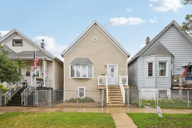 4842 S Wallace St, Chicago, IL 60609 - view of front of property with a gate and a fenced front yard