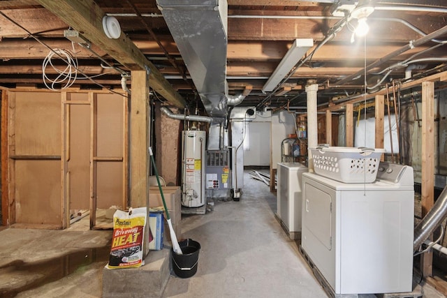 4842 S Wallace St, Chicago, IL 60609 - unfinished below grade area featuring gas water heater, washer and clothes dryer, and heating unit