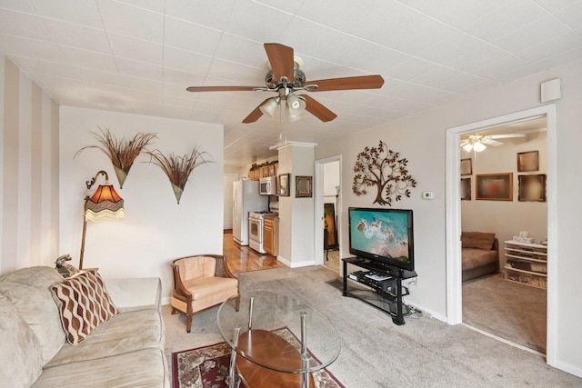 4842 S Wallace St, Chicago, IL 60609 - living area featuring a ceiling fan, light carpet, and wallpapered walls