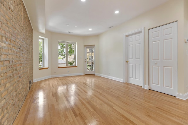 3415 W Berteau Ave Unit 1, Chicago, IL 60618 - spare room with light wood-style floors and recessed lighting