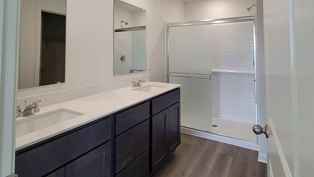13743 S Palmetto Dr, Plainfield, IL 60544 - bathroom with a shower stall, wood finished floors, and double vanity