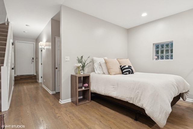 1212 W School St, Chicago, IL 60657 - bedroom featuring wood finished floors and recessed lighting