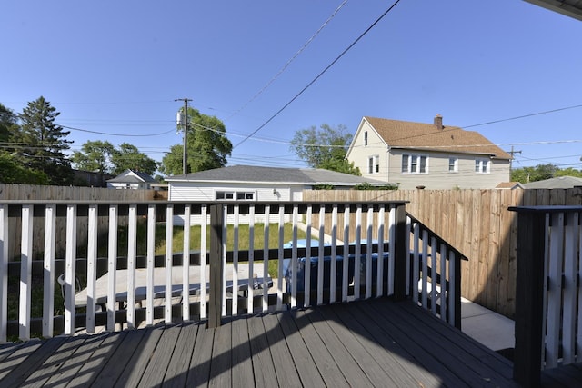 422 Sibley Blvd, Calumet City, IL 60409 - wooden deck with a fenced backyard and an outdoor structure