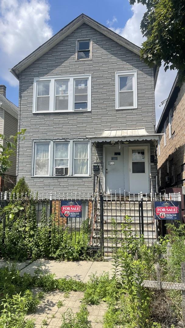 4838 S Bishop St, Chicago, IL 60609 - view of front facade featuring brick siding