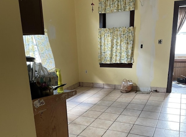 4838 S Bishop St, Chicago, IL 60609 - unfurnished dining area featuring tile patterned floors