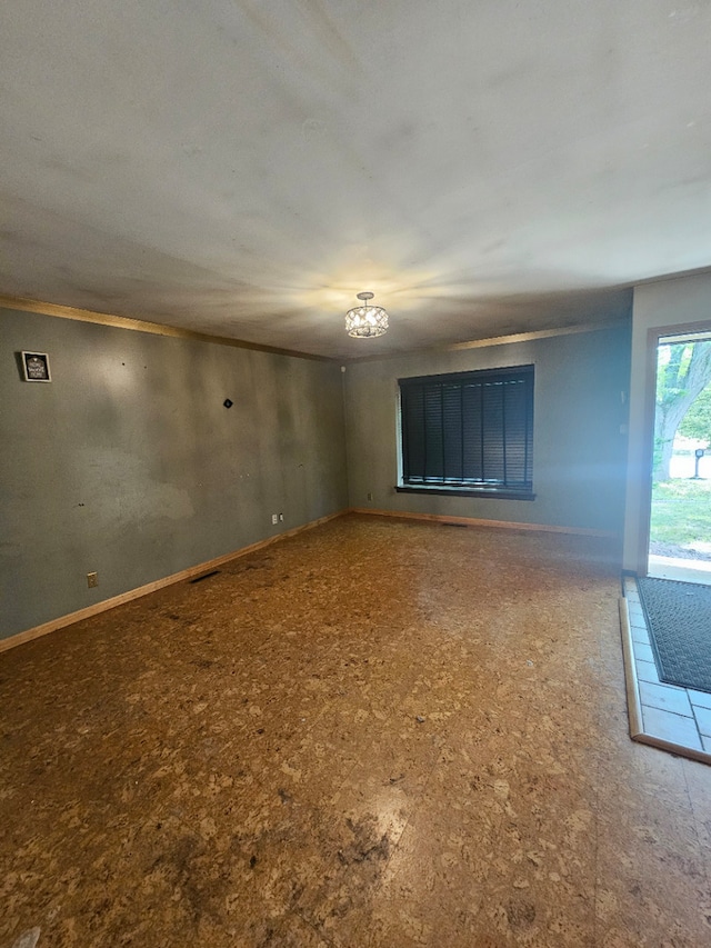 340 Somerset Dr, Streamwood, IL 60107 - empty room featuring a chandelier and baseboards