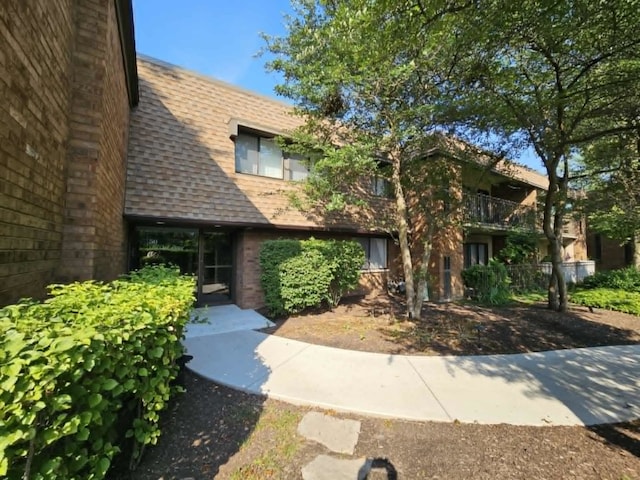 50 Old Oak Dr Unit 114, Buffalo Grove, IL 60089 - view of front of property featuring roof with shingles