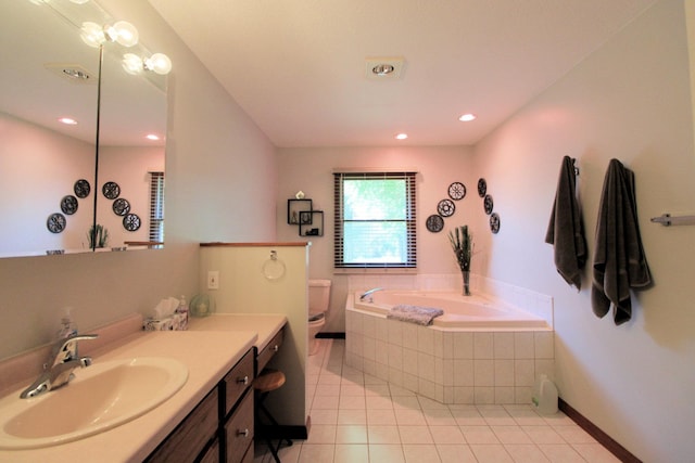 396 W 8th St, Manteno, IL 60950 - bathroom with vanity, a garden tub, tile patterned floors, and recessed lighting