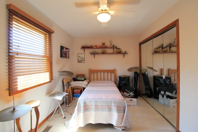 396 W 8th St, Manteno, IL 60950 - bedroom with a closet, carpet floors, and a ceiling fan