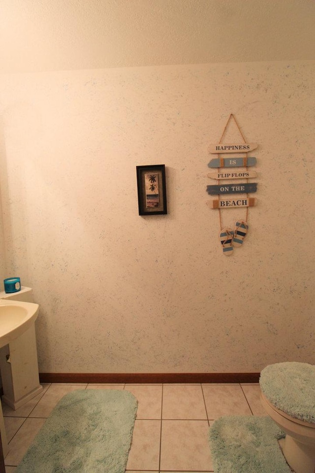 396 W 8th St, Manteno, IL 60950 - bathroom featuring tile patterned flooring and vanity