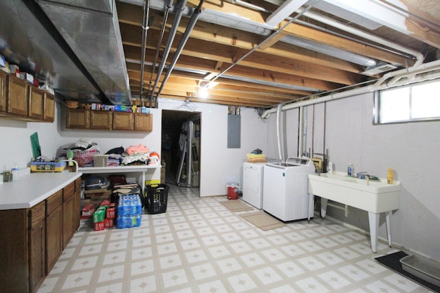 396 W 8th St, Manteno, IL 60950 - basement featuring independent washer and dryer, light flooring, and electric panel