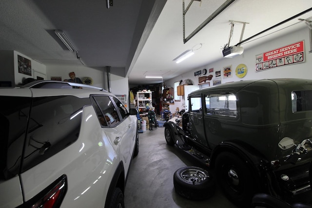 396 W 8th St, Manteno, IL 60950 - garage featuring a garage door opener