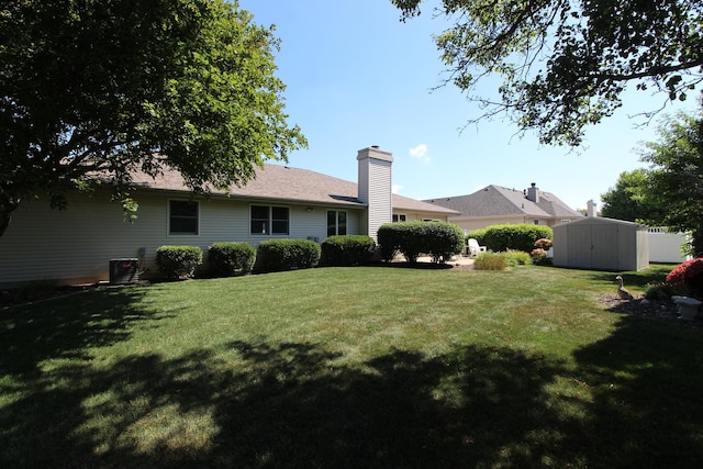 396 W 8th St, Manteno, IL 60950 - view of green lawn with a storage unit