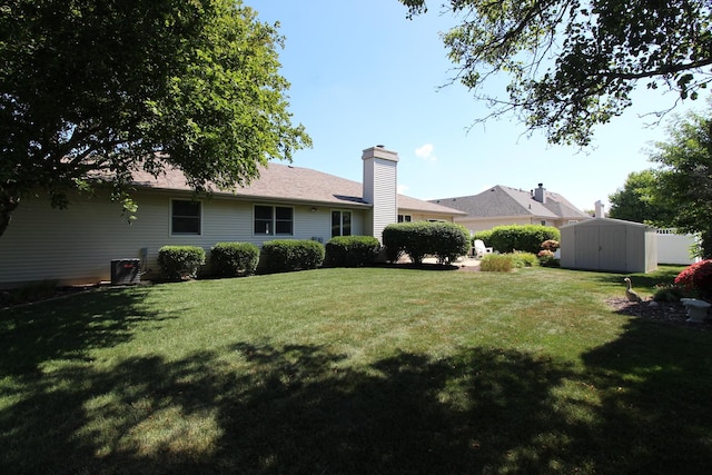 396 W 8th St, Manteno, IL 60950 - view of green lawn with a storage shed