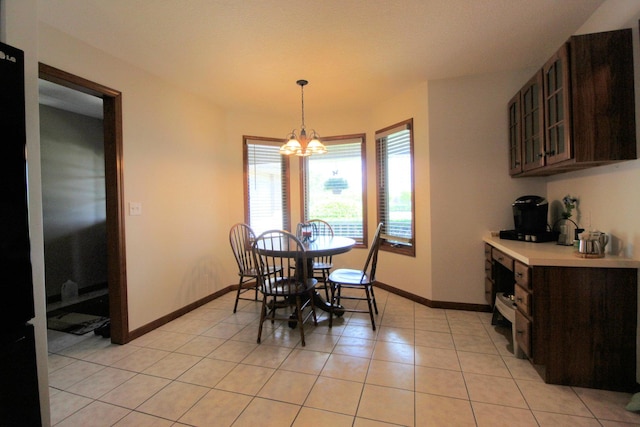 396 W 8th St, Manteno, IL 60950 - dining room with a chandelier and light tile patterned flooring