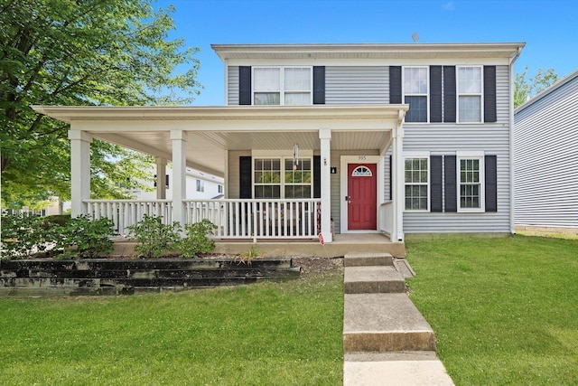 995 Serendipity Dr, Aurora, IL 60504 - view of front of home with covered porch and a front lawn