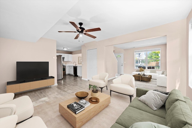 995 Serendipity Dr, Aurora, IL 60504 - living area with a ceiling fan and light wood-style floors