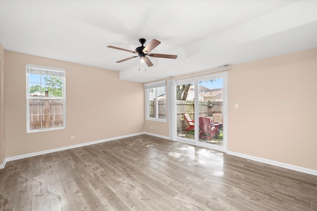 995 Serendipity Dr, Aurora, IL 60504 - empty room with ceiling fan and wood finished floors