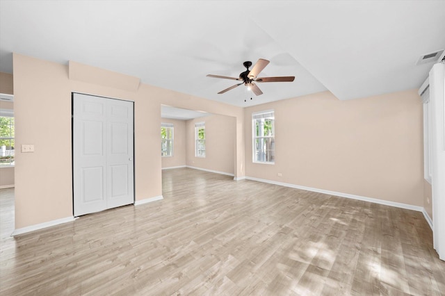 995 Serendipity Dr, Aurora, IL 60504 - unfurnished bedroom featuring light wood-style flooring, a closet, and a ceiling fan