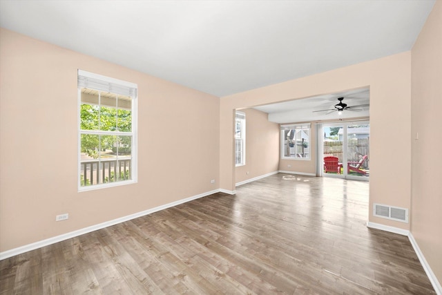 995 Serendipity Dr, Aurora, IL 60504 - empty room with wood finished floors and a ceiling fan
