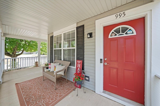 995 Serendipity Dr, Aurora, IL 60504 - doorway to property featuring covered porch