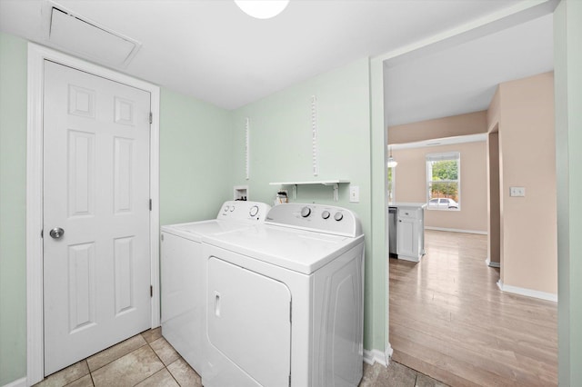 995 Serendipity Dr, Aurora, IL 60504 - washroom with washing machine and dryer and baseboards