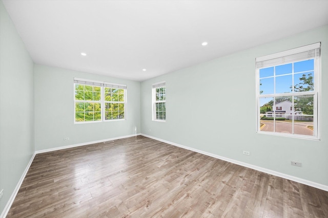 995 Serendipity Dr, Aurora, IL 60504 - unfurnished room featuring wood finished floors and recessed lighting