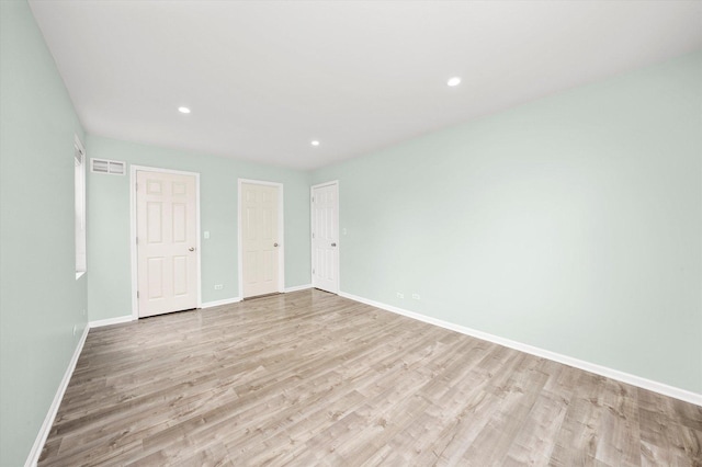 995 Serendipity Dr, Aurora, IL 60504 - unfurnished bedroom with light wood finished floors and recessed lighting