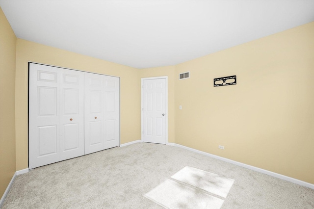 995 Serendipity Dr, Aurora, IL 60504 - unfurnished bedroom featuring light colored carpet and a closet