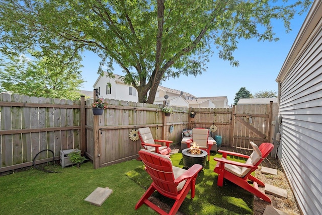 995 Serendipity Dr, Aurora, IL 60504 - fenced backyard featuring a fire pit and a gate