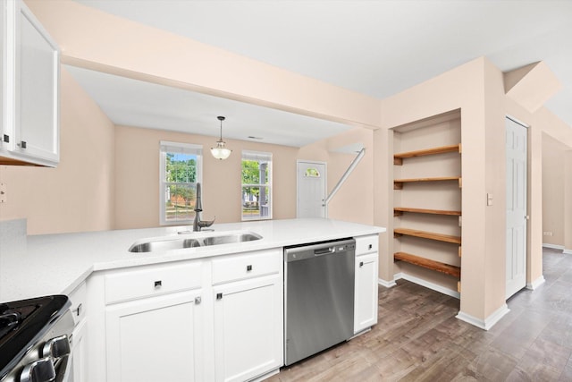 995 Serendipity Dr, Aurora, IL 60504 - kitchen with stainless steel appliances, white cabinets, light wood finished floors, light countertops, and a peninsula