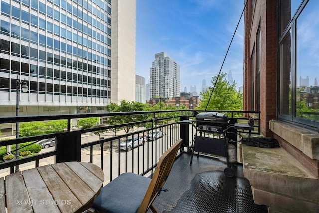 525 W Superior St Unit 224, Chicago, IL 60654 - balcony featuring a skyline view and grilling area