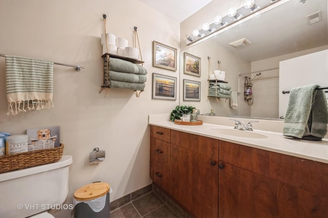 525 W Superior St Unit 224, Chicago, IL 60654 - bathroom with tile patterned floors, vanity, and a shower