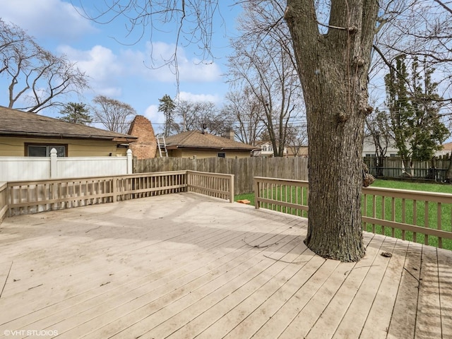 665 Cindy Ln, Wheeling, IL 60090 - wooden deck with a fenced backyard