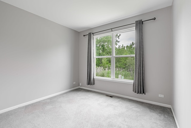 241 Stonington Dr, Bloomingdale, IL 60108 - carpeted empty room featuring baseboards