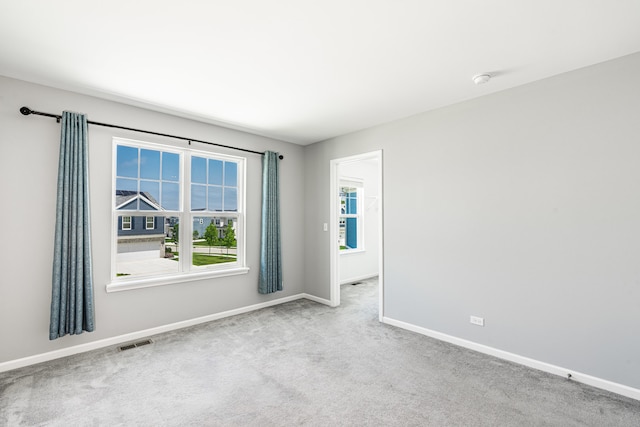 241 Stonington Dr, Bloomingdale, IL 60108 - spare room with baseboards and carpet floors