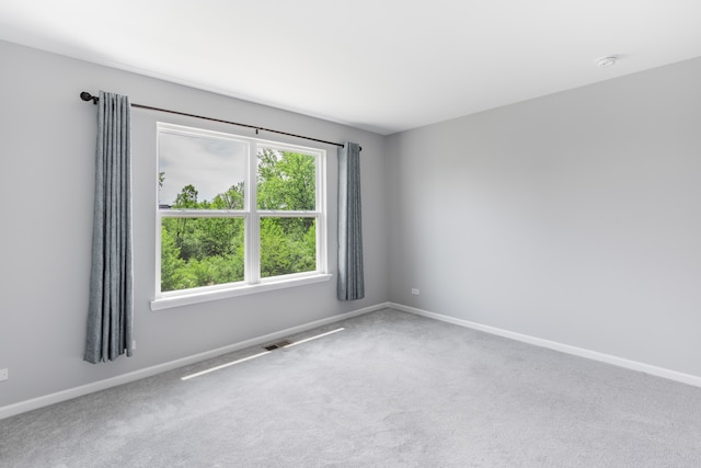 241 Stonington Dr, Bloomingdale, IL 60108 - empty room featuring carpet and baseboards