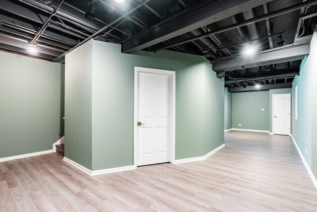 241 Stonington Dr, Bloomingdale, IL 60108 - finished basement featuring wood finished floors and baseboards