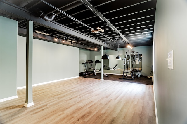 241 Stonington Dr, Bloomingdale, IL 60108 - workout area featuring wood finished floors and baseboards