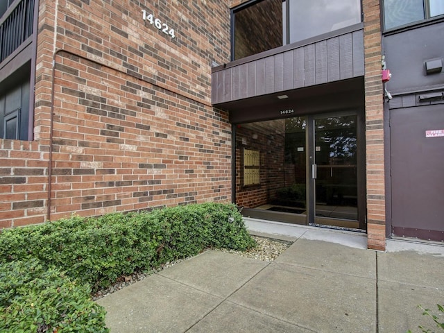 14624 Scarborough Ct S Unit G-1, Oak Forest, IL 60452 - view of exterior entry featuring a balcony and brick siding