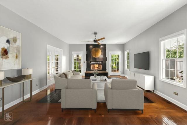 100 Homestead Dr, Wood Dale, IL 60191 - living area featuring wood finished floors, healthy amount of natural light, and a ceiling fan